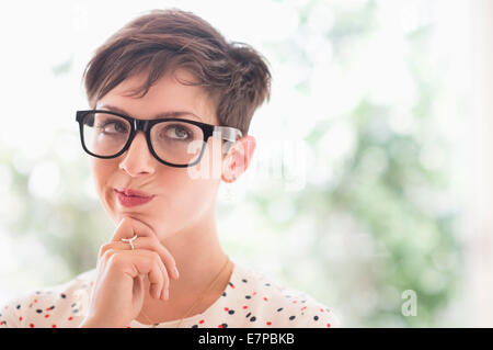 Portrait of smiling woman wearing eyeglasses Stock Photo