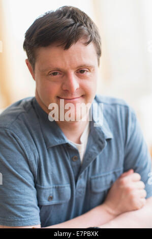 Portrait of man with down syndrome Stock Photo
