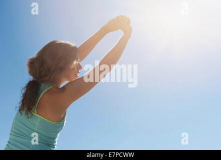 Young woman exercising Stock Photo