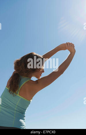 Young woman exercising Stock Photo