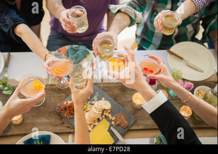 People toasting at party Stock Photo