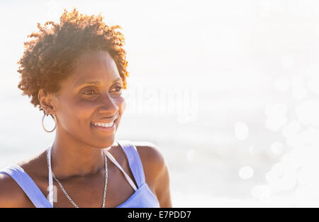 Portrait of woman on beach Stock Photo