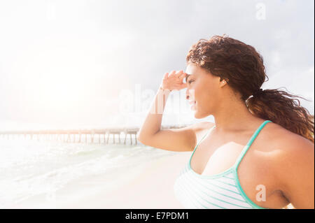 USA, Florida, Jupiter, Portrait of woman looking at sea Stock Photo