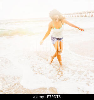 USA, Florida, Jupiter, Portrait of woman standing on beach Stock Photo