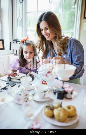 Lady Pouring Tea at Afternoon Tea The Goring Hotel 