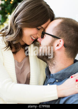 Couple rubbing noses Stock Photo