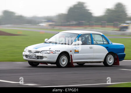 A rally car takes to the track at Rallyday at Castle Combe Stock Photo