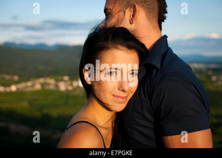Teenage couple on a late summer afternoon in park Stock Photo