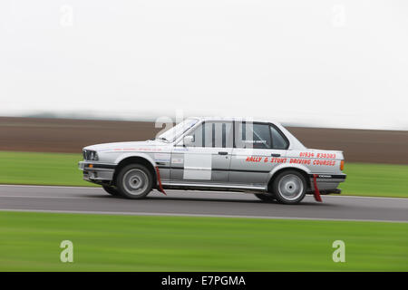 A rally car takes to the track at Rallyday at Castle Combe Stock Photo