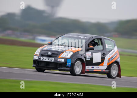 A rally car takes to the track at Rallyday at Castle Combe Stock Photo