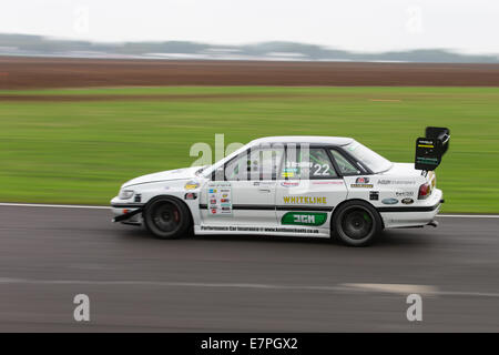 A rally car takes to the track at Rallyday at Castle Combe Stock Photo