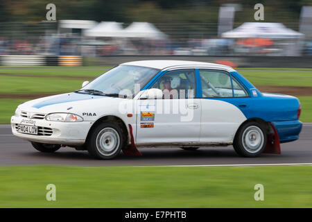 A rally car takes to the track at Rallyday at Castle Combe Stock Photo