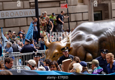 New York, USA. 22nd Sep, 2014. Protestors take part in the 'flood Wall Street' demonstrations against climate change in New York, the United States, Spet. 22, 2014. Credit:  Yin Bogu/Xinhua/Alamy Live News Stock Photo