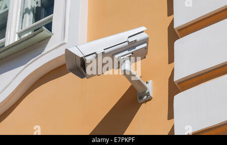 Security or cctv camera on wall background Stock Photo