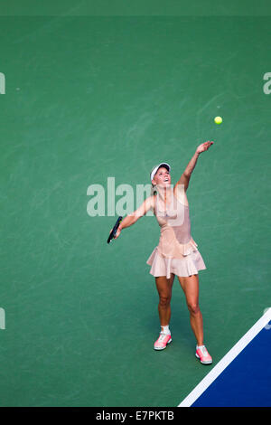 Flushing Meadows, NY, USA. 31th Aug, 2014. Caroline Wozniacki (DEN) defeats Maria Sharapova (RUS)  in 4th round action at the US Stock Photo