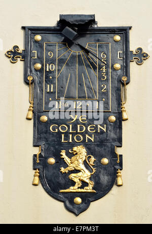 London, England, UK. Sundial on the wall of Ye Golden Lion public house at 52 Dean Street, Soho Stock Photo