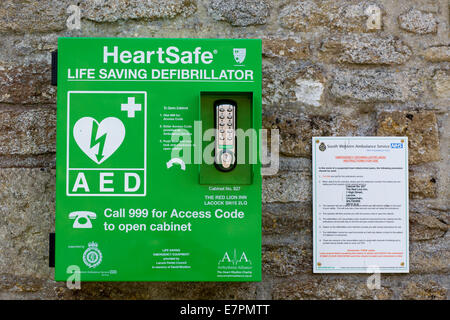 Heart safe  Automated External Defibrillator attached to a stone wall Stock Photo