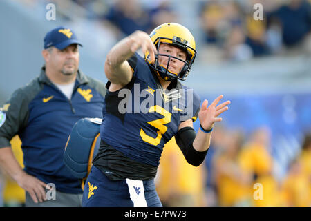 Morgantown, West Virginia, USA. 17th Feb, 2013. West Virginia Mountaineers quarterback SKYLER HOWARD (3) warms up prior to the Big 12 conference football game being played at Mountaineer Field in Morgantown, WV. The Sooners beat the Mountaineers 45-33. © Ken Inness/ZUMA Wire/Alamy Live News Stock Photo