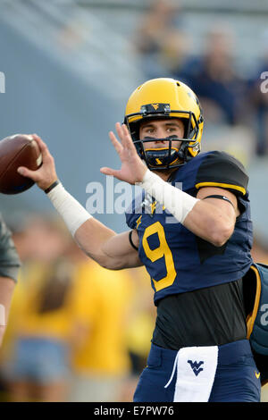 Morgantown, West Virginia, USA. 17th Feb, 2013. West Virginia Mountaineers quarterback CLINT TRICKETT (9) warms up prior to the Big 12 conference football game being played at Mountaineer Field in Morgantown, WV. The Sooners beat the Mountaineers 45-33. © Ken Inness/ZUMA Wire/Alamy Live News Stock Photo