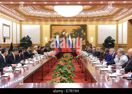 Beijing, China. 23rd Sep, 2014. Zhang Dejiang (5th L), chairman of the Standing Committee of China's National People's Congress, meets with Valentina Matviyenko (7th R), chairperson of Russia's Federal Assembly, in Beijing, capital of China, Sept. 23, 2014. Credit:  Rao Aimin/Xinhua/Alamy Live News Stock Photo