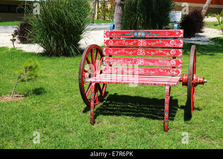 Red Wooden Benches in the Garden Stock Photo