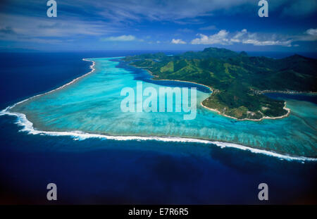 Aerial view of Huahine Island anchored in the blue South Pacific in the French Polynesia archipelago also called Society Islands Stock Photo