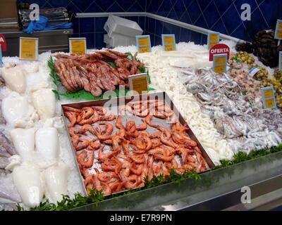 Different types of fish for sale at a market stall Stock Photo