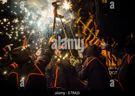 Barcelona, Spain. 21st Sep, 2014. The correfocs, dancing devils, enlighten the night with their massive fire crackers at the Merce 2014 Credit:  matthi/Alamy Live News Stock Photo