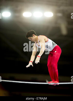 Incheon, South Korea. 23rd Sep, 2014. Park Minsoo of South Korea competes during the horizontal bar of the men's individual all-around contest of gymnastics artistic at the 17th Asian Games in Incheon, South Korea, Sept. 23, 2014. © Fei Maohua/Xinhua/Alamy Live News Stock Photo