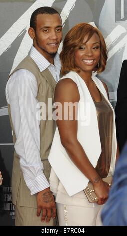 Dallas Mavericks' player Monta Ellis (L) and his wife Juanika Amos Ellisarrive for the world premiere of the film 'Nowitzki - The Perfect Shot' in Cologne, Germany, 16 September 2014. Photo: Horst Galuschka/dpa - NO WIRE SERVICE - Stock Photo