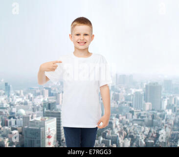 smiling little boy in white blank t-shirt Stock Photo