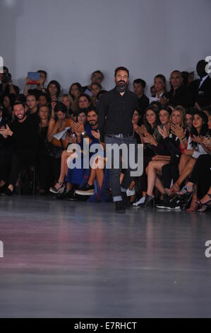 Designer Ennio Capasa acknowledges the audience after the Costume National show Stock Photo