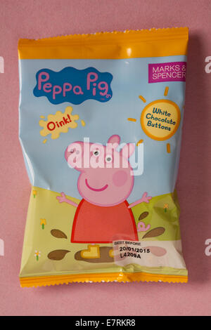 Bag of Marks & Spencer Peppa Pig White Chocolate Buttons isolated on pink background Stock Photo