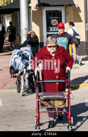 Miami Beach Florida,senior seniors old citizen citizens pensioner pensioners retired elderly,adult adults woman women female lady,walker,disabled,cros Stock Photo