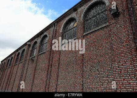 Sir Thomas More’s entire novel ‘Utopia’ written in paint on a building in Norwich. Stock Photo