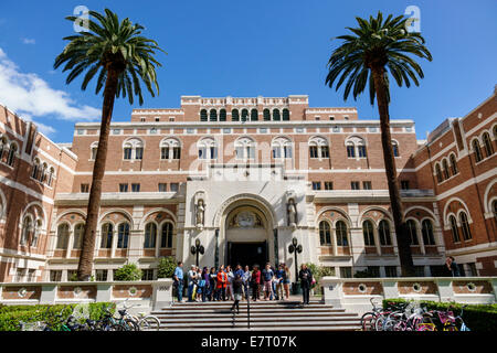 Los Angeles California,USC,University of Southern California,college,campus,building,exterior,Edward Doheny Jr. Memorial Library,palm tree,shadow,cour Stock Photo