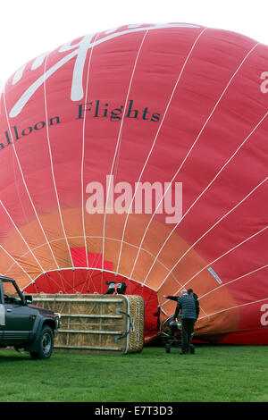 Inflating a hot air balloon, Shropshire, UK Stock Photo