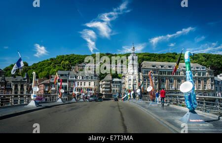 Colourful saxaphones lining each side of a bridge in Dinant, Belgium Stock Photo