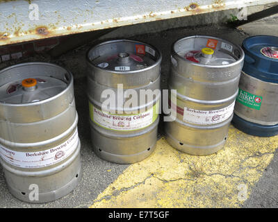 Beer kegs are lined up under loading dock for use at a musical festival in the Berkshires of Massachusetts, USA. Stock Photo