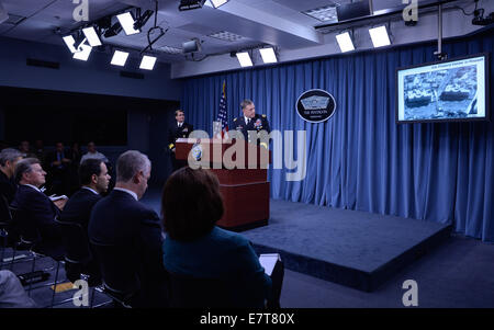 Washington DC, USA. 23rd Sep, 2014. US Lieutenant General William Mayville briefs the press during a briefing at the Pentagon in Washington, DC, capital of the United States, Sept. 23, 2014. The airstrikes on the Islamic State (IS) targets in Syria overnight Monday were 'only the beginning' of a coalition effort of the Unites States and its Arabic allies in the anti-IS fight, a Pentagon spokesman said Tuesday. Meanwhile, U.S. Lieutenant General William Mayville detailed the airstrikes, saying that the initial attack came in three waves. The first was launched from sea by cr Stock Photo