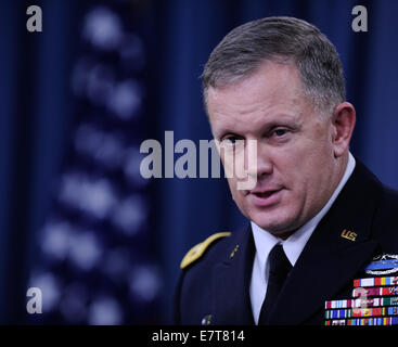 Washington DC, USA. 23rd Sep, 2014. US Lieutenant General William Mayville briefs the press during a briefing at the Pentagon in Washington, DC, capital of the United States, Sept. 23, 2014. The airstrikes on the Islamic State (IS) targets in Syria overnight Monday were 'only the beginning' of a coalition effort of the Unites States and its Arabic allies in the anti-IS fight, a Pentagon spokesman said Tuesday. Meanwhile, U.S. Lieutenant General William Mayville detailed the airstrikes, saying that the initial attack came in three waves. The first was launched from sea by cr Stock Photo