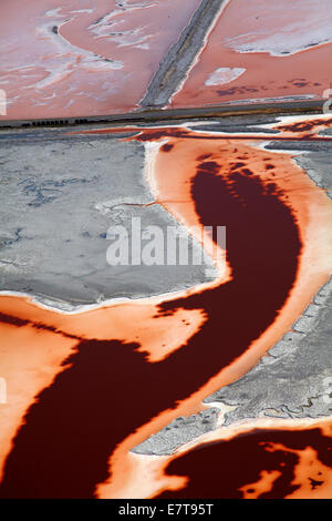 Colourful algae in salt evaporation ponds, Redwood City, San Francisco Bay, San Francisco, California, USA - aerial Stock Photo