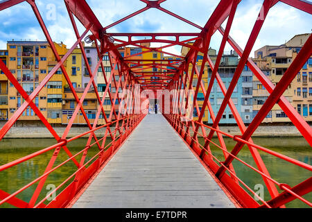 Red bridge or Eiffel Bridge, built by the Eiffel company, over the Onyar river, Girona, Catalonia, Spain Stock Photo
