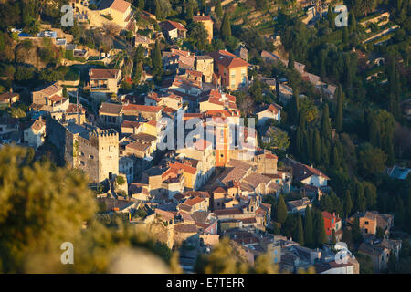 Roquebrune village with its medieval castle and church in the evening light, seen from Mont Gros, Roquebrune Cap Martin Stock Photo