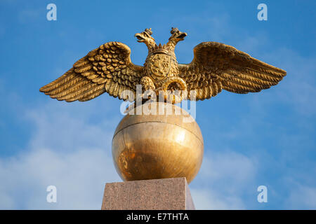 Golden Double Eagle seat on sphere, Russian coat of arms Stock Photo