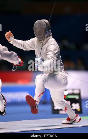 Incheon, South Korea. 24th Sep, 2014. /Kenta Tokunan (JPN) Fencing : Men's Team Sabre at Dowon Gymnasium during the 2014 Incheon Asian Games in Incheon, South Korea . Credit:  Aflo Co. Ltd./Alamy Live News Stock Photo