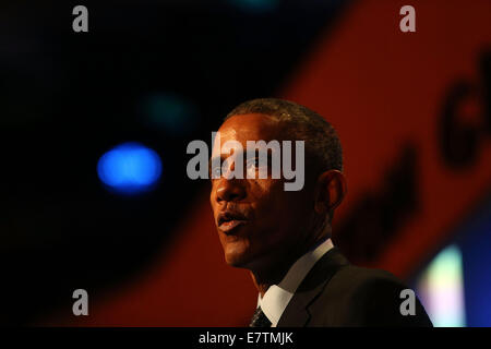 New York, USA. 23rd September, 2014. President Barack Obama, who is in New York City for the 69th Session of the United Nations General Assembly, speaks at the Clinton Global Initiative on September 23, 2014 in New York City. World leaders, activists and protesters have converged on New York City for the annual UN event that brings together the global leaders for a week of meetings and conferences. This year 's General Assembly has highlighted the problem of global warming and how countries need to strive to reduce greenhouse gas emissions. Credit:  dpa picture alliance/Alamy Live News Stock Photo