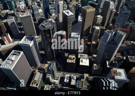 Looking down onto skyscrapers around Market Street and California Street, downtown San Francisco, California - aerial Stock Photo