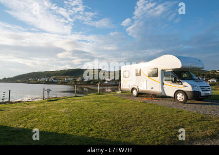A motorhome parked on Kinloch Campsite  on the edge of Loch Dunvegan Isle of Skye Scotland UK Stock Photo