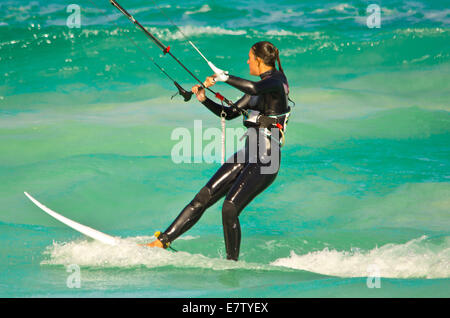 Girl kite boarding on playa del medano. Stock Photo